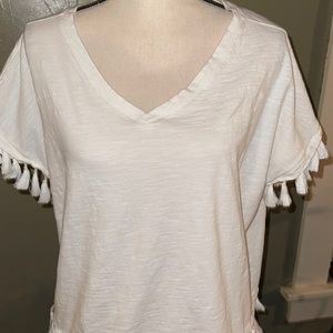 Cute White t-shirt with tassels on sleeves and bottom of shirt